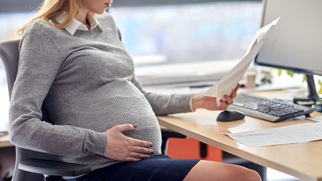 Workstation adjustment for a pregnant woman